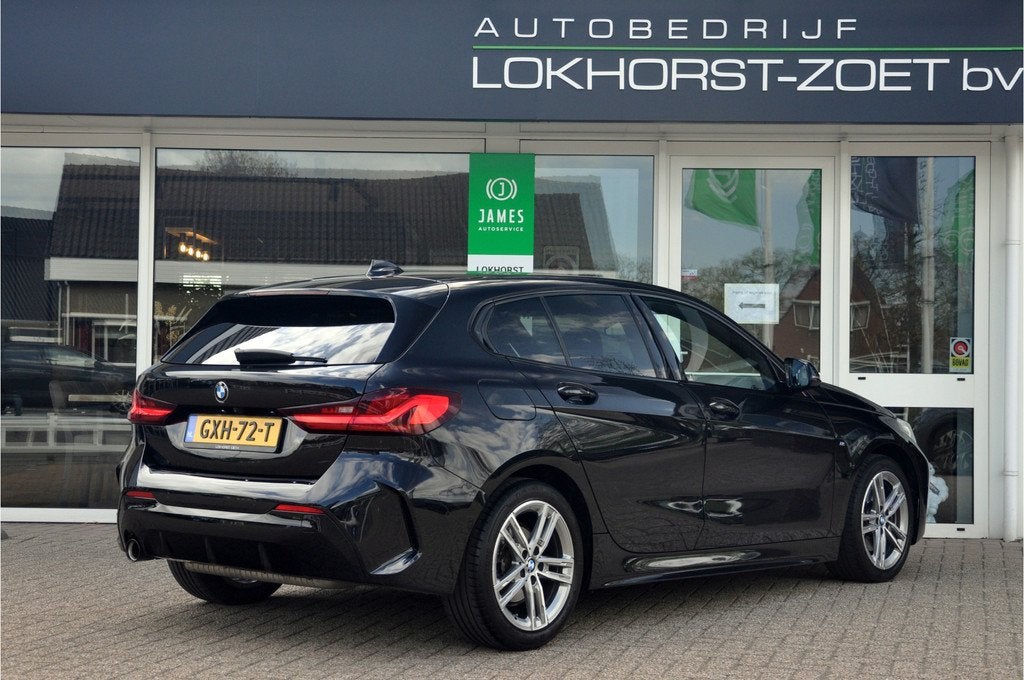 BMW 1-serie 118i High Executive M-Sport | Zeer mooie staat!, 136 pk, Gebruikt, Leder en Stof, Zwart