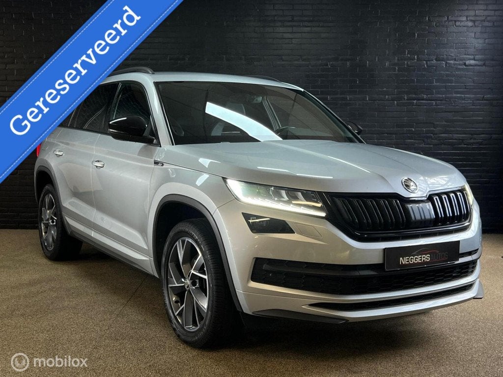 Skoda Kodiaq 1.5 TSI Sportline Business 1e EIG LED ADAP DSG, Auto's, Skoda, Zwart, 4 cilinders, 150 pk, Automatische klimaatregeling