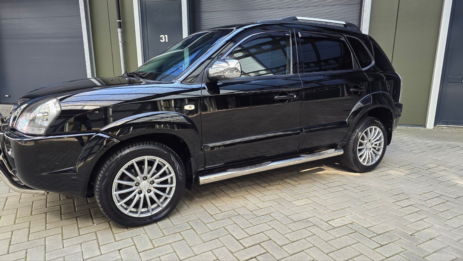 Hyundai Tucson 2.0 I 2WD 2006 Zwart cruise cntrol, Zwart, 4 cilinders, Zwart, Handgeschakeld