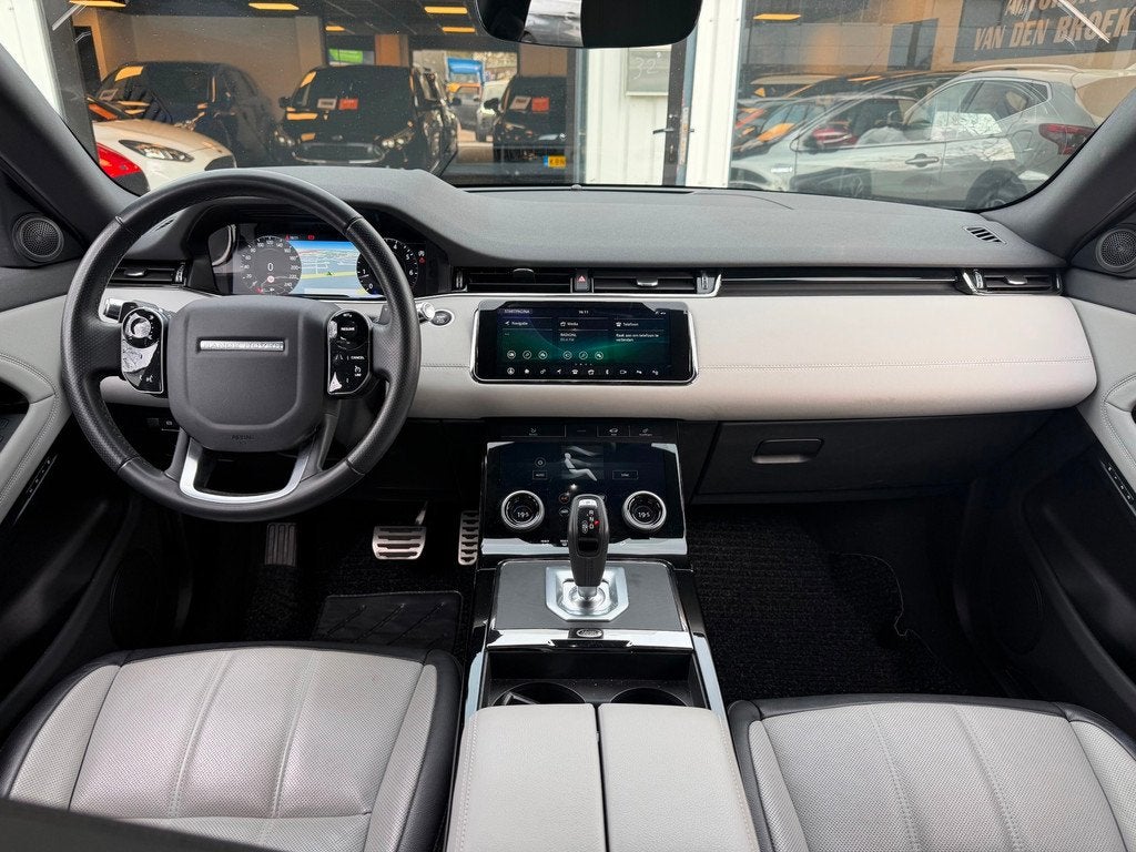 Land Rover Range Rover Evoque 2.0 P200 AWD R-Dynamic|Dealer, Auto's, Land Rover, Gebruikt, Zwart, 4 cilinders, Adaptive Cruise Control