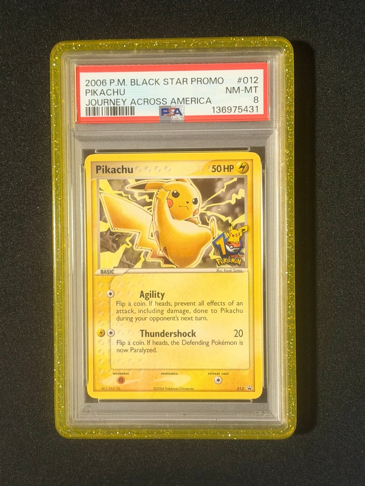 Pikachu #012 | PSA 8 | Black Star Promo | Stamp, Ophalen of Verzenden, Zo goed als nieuw, Losse kaart