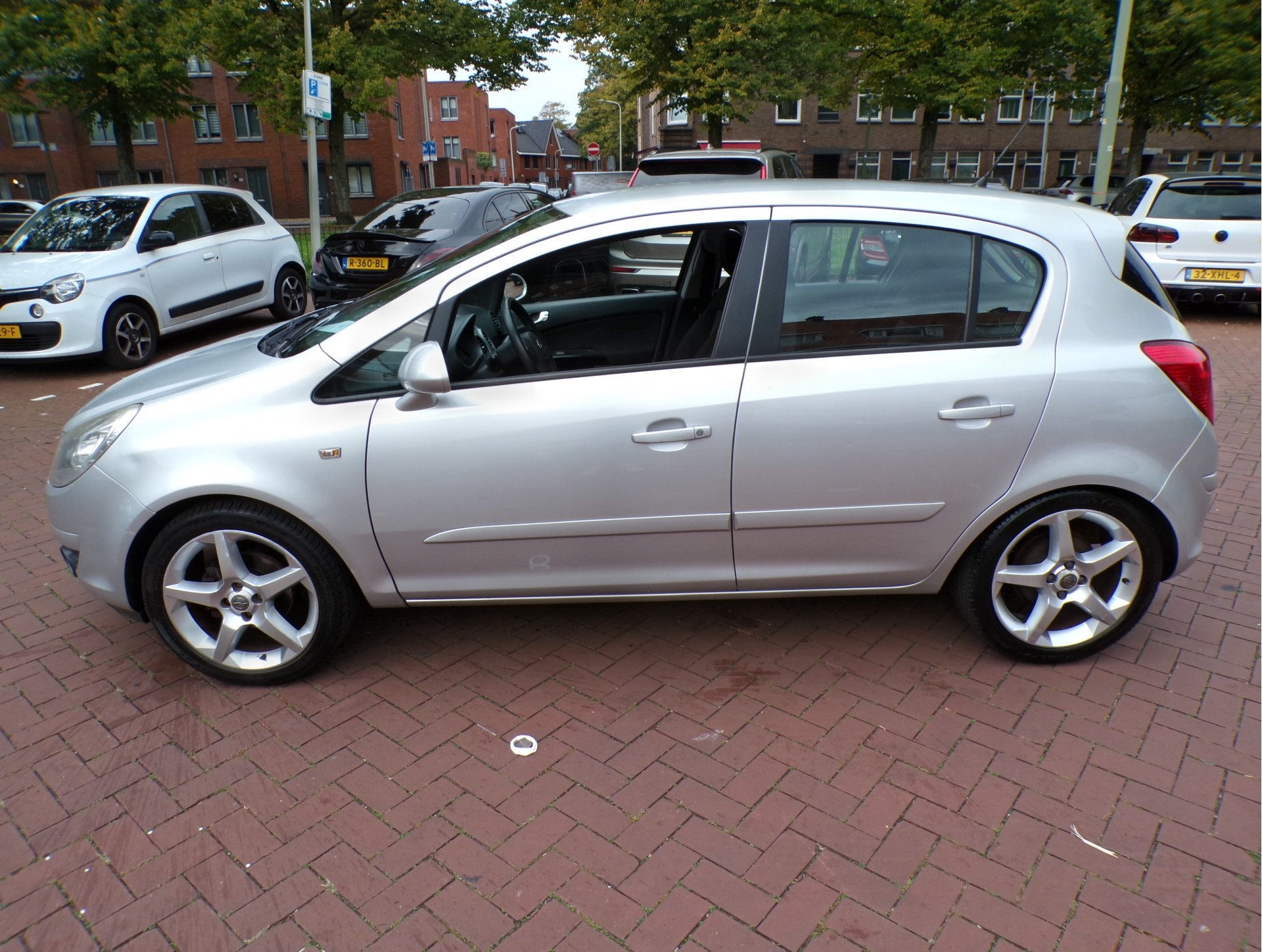 Opel Corsa 1.4-16V Business Sport (bj 2008), Auto's, Voorwielaandrijving, Dealer onderhouden, 1063 kg, Gebruikt