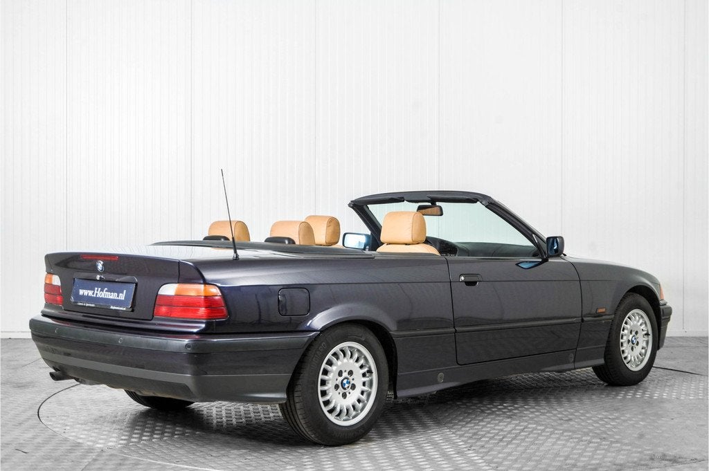 BMW 3 Serie Cabrio 318i Executive (bj 1996, automaat), Auto's, Achterwielaandrijving, 4 cilinders, Cabriolet, Leder