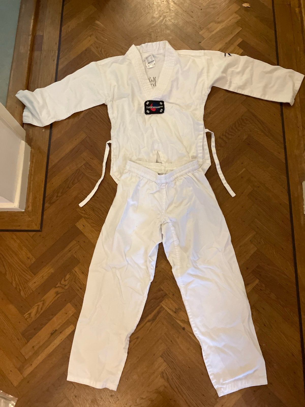 Taekwondo pak Decathlon 130 cm, Ophalen, Gebruikt, Taekwondo, Vechtsportpak