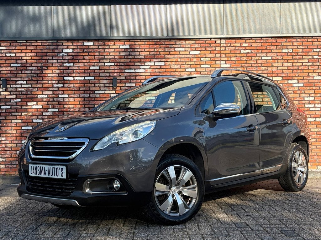 Peugeot 2008 1.2 PureTech Allure Nav/Cruise Pdc Clima Hoogzi, Auto's, Voorwielaandrijving, Stof, Gebruikt, Zwart