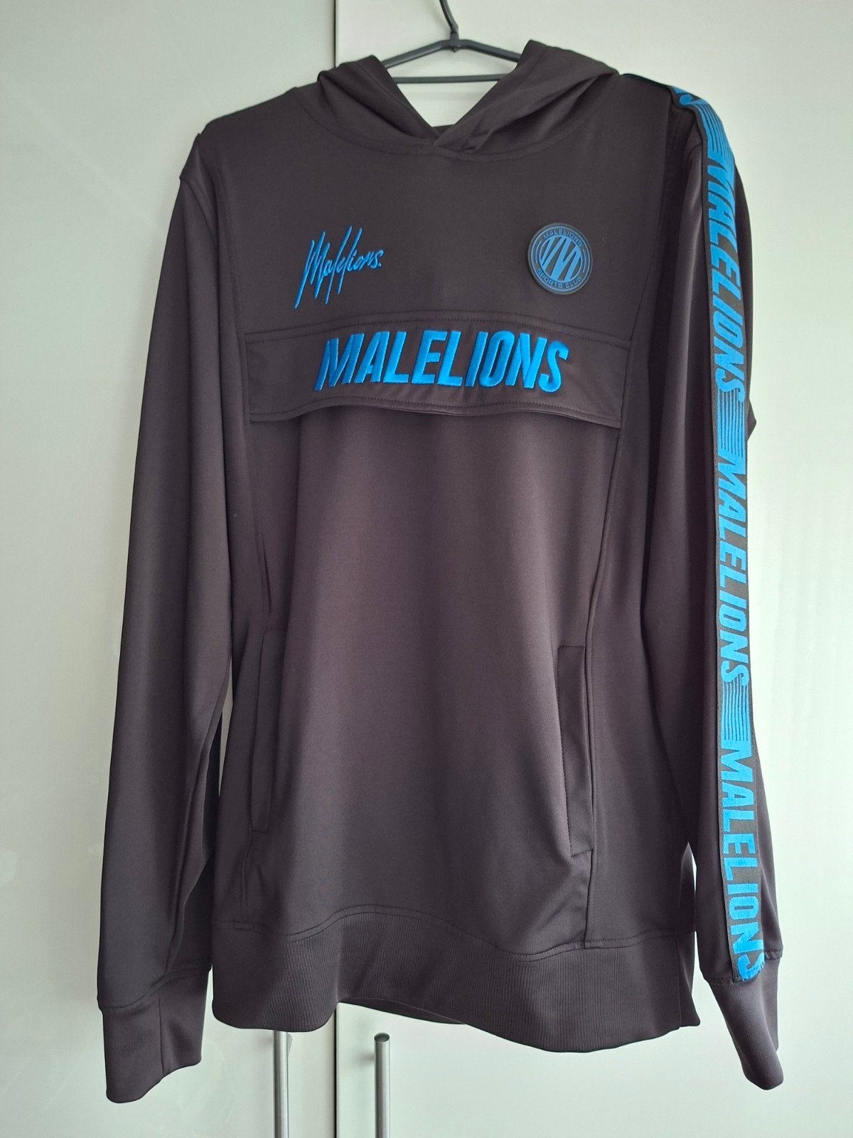 malelions trainingspak zwart/blauw maat M, Ophalen, Zo goed als nieuw, Maat 48/50 (M), Blauw