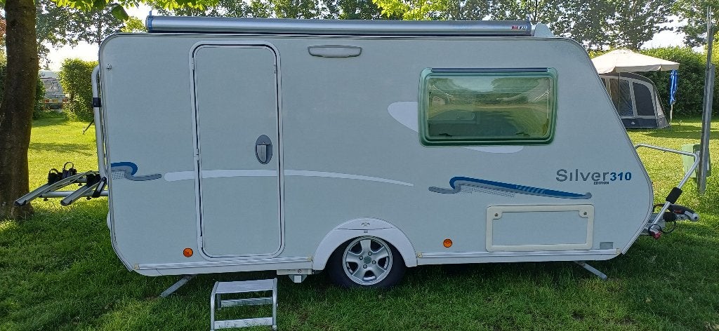 Trigano Silver 310 bwj. 2010  mover en opblaasbare voortent, Trigano, Tot en met 2, Treinzit, Particulier