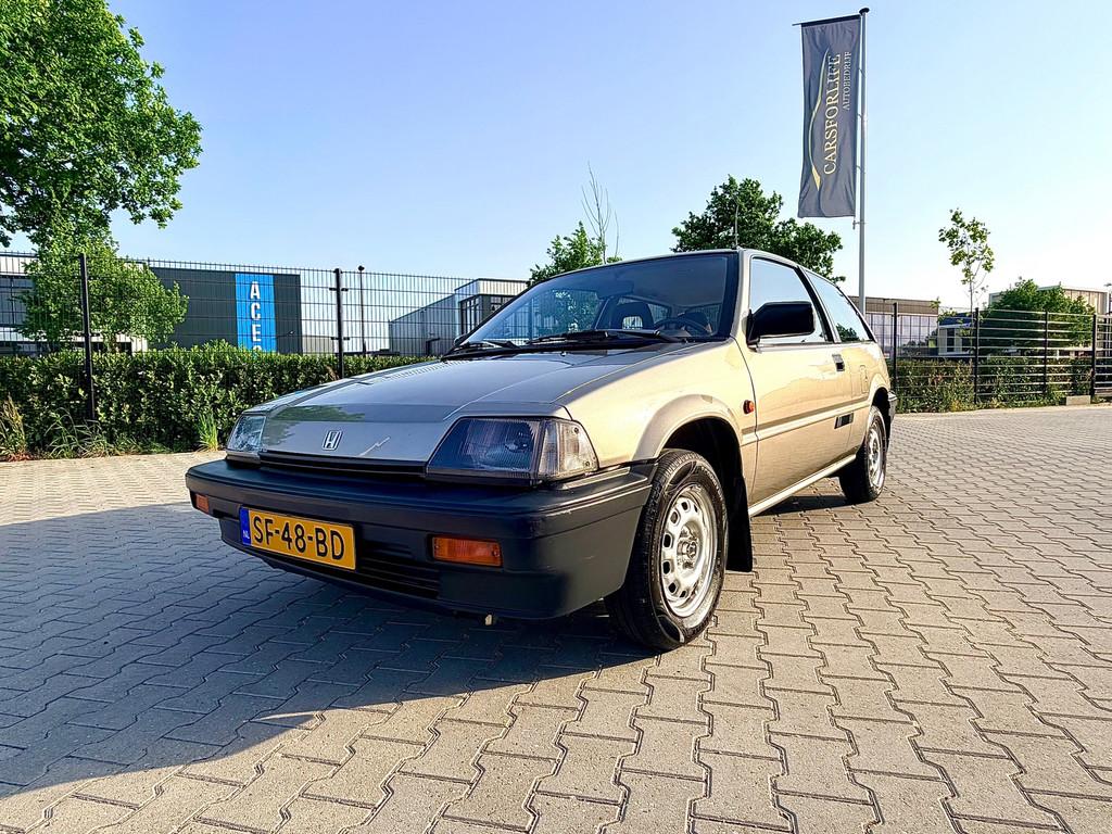 Honda Civic 1.3 Luxe Automaat (1e Eigenaar) N.A.P, Auto's, Honda, Stof, Gebruikt, Beige, 4 cilinders
