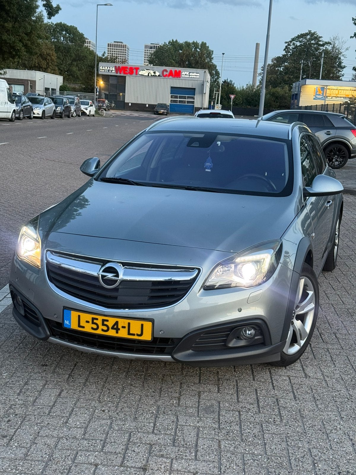 Opel Insignia Sports Tourer BiTurbo 4x4, Auto's, Euro 5, Stof, 1995 cc, Zwart