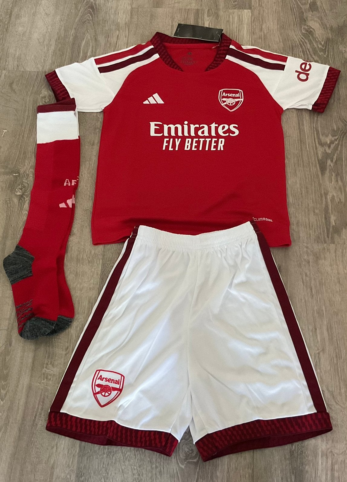 Arsenal tenue nieuw maat:128, Maat XS of kleiner, Ophalen of Verzenden, Zo goed als nieuw, Set