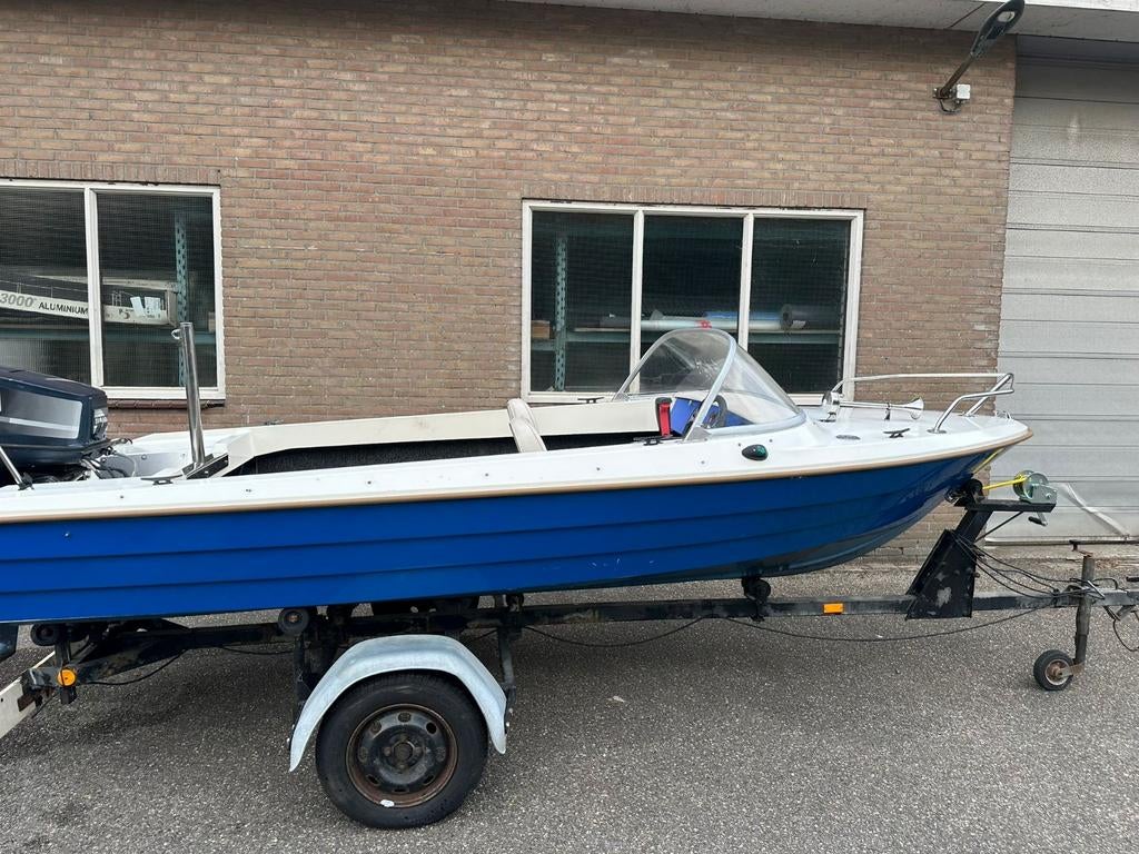 Consoleboot 60pk buitenboordmotor + trailer, Watersport en Boten, Ophalen, 3 tot 6 meter, Buitenboordmotor, 50 tot 70 pk