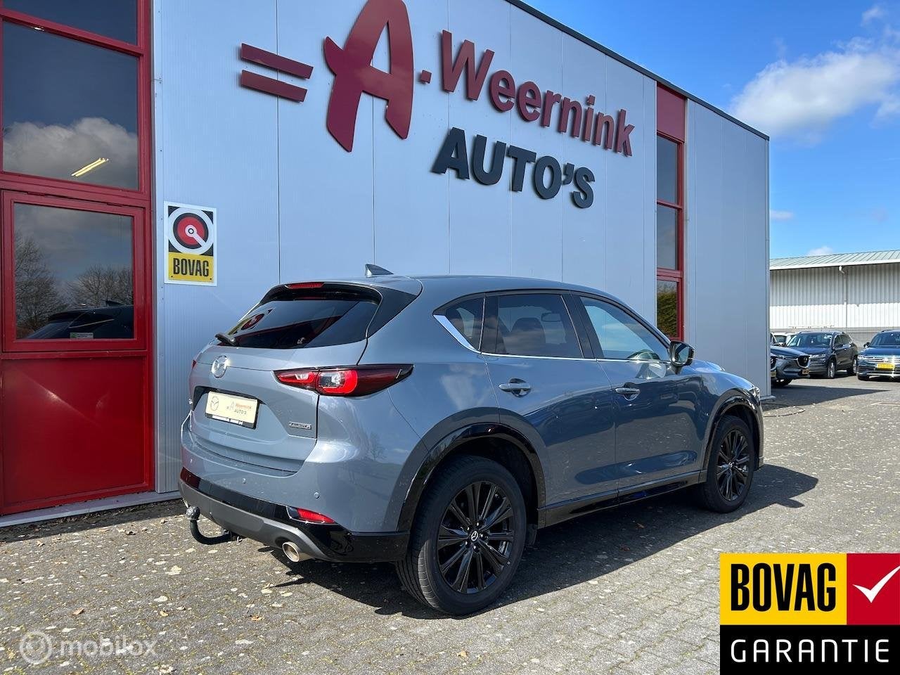 Mazda CX-5 2.0 SkyActiv-G 165 Homura Limited, Gebruikt, Zwart, 1507 kg, 14 km/l