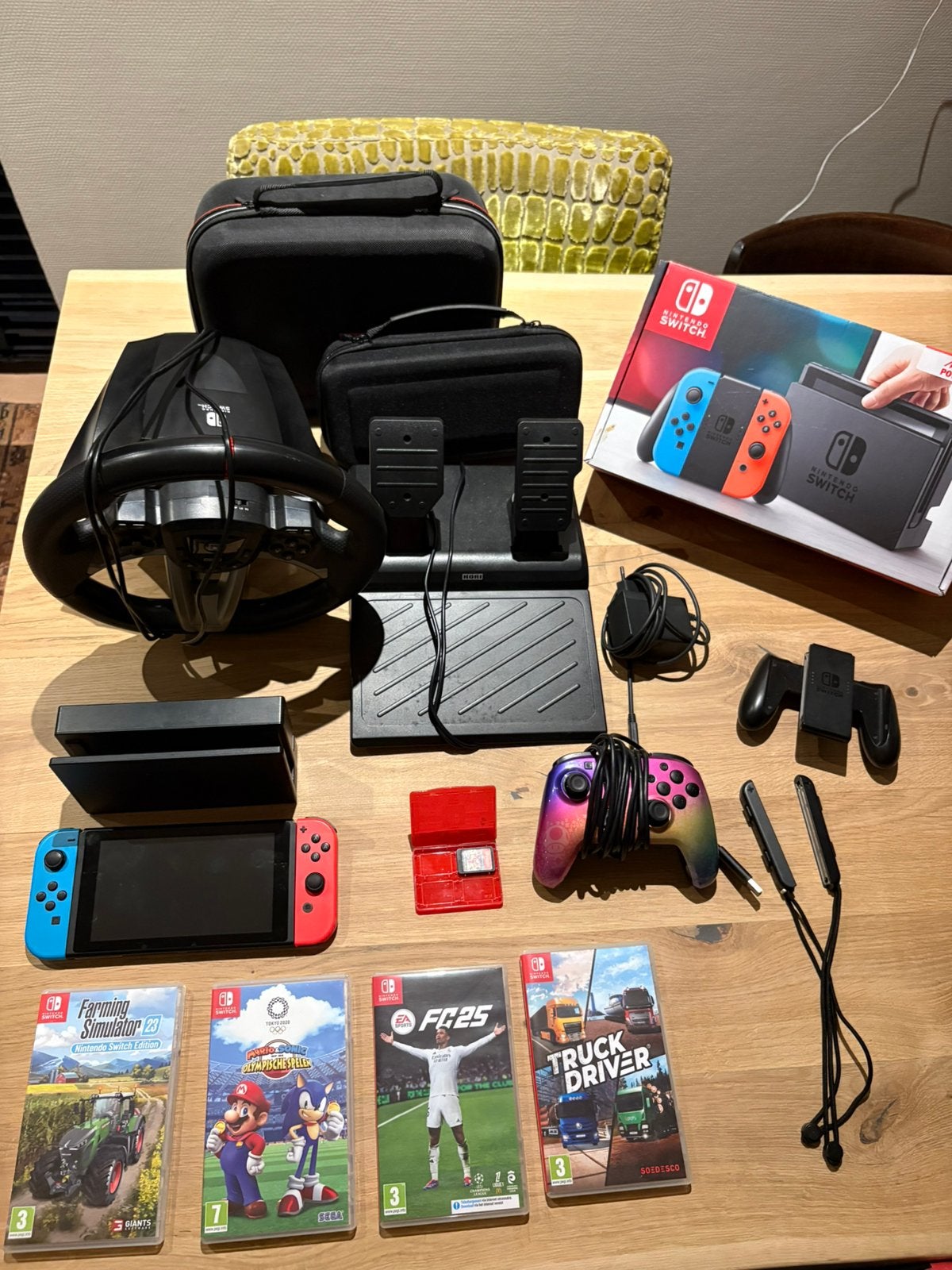Nintendo Switch complete set met stuur, controllers en games, Ophalen of Verzenden, Switch Original, Met 3 controllers of meer