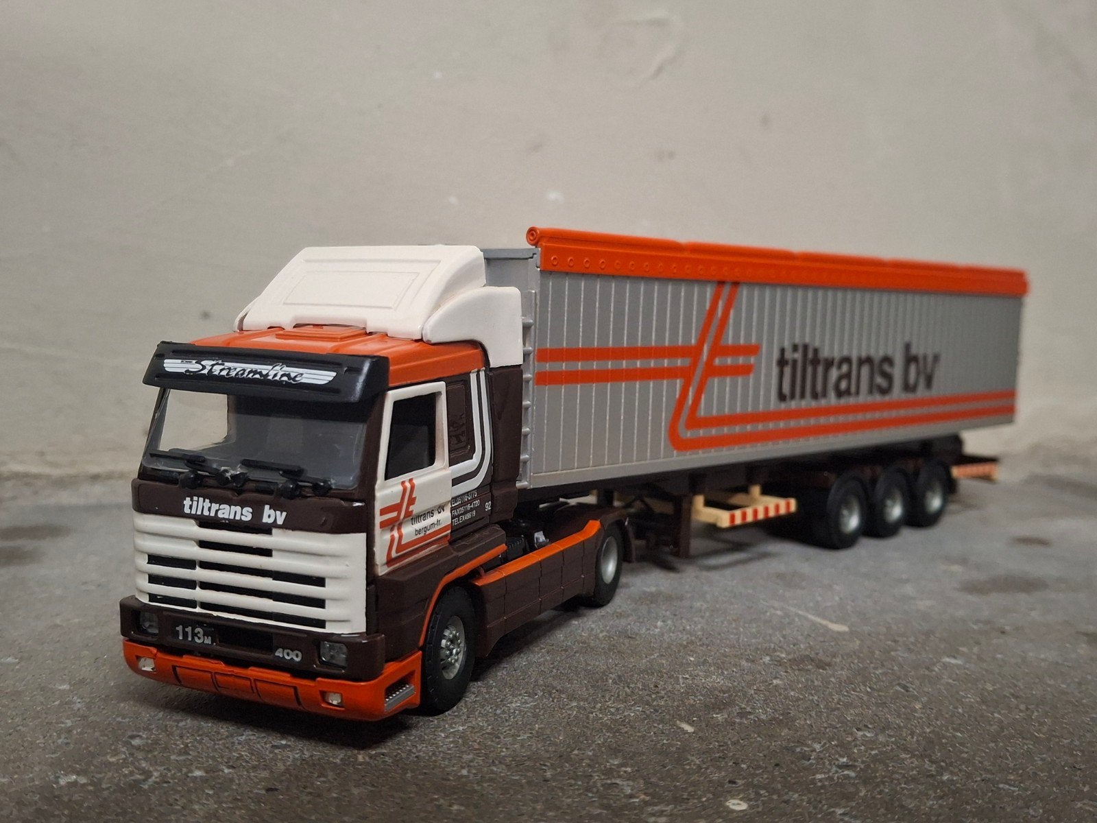 Tekno Scania 113M Streamline Tiltrans b.v., Ophalen of Verzenden, Zo goed als nieuw, Bus of Vrachtwagen, Tekno
