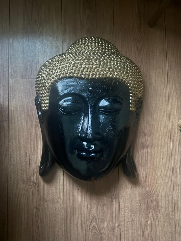 Boeddha-hoofd (wanddecoratie), Ophalen, Gebruikt