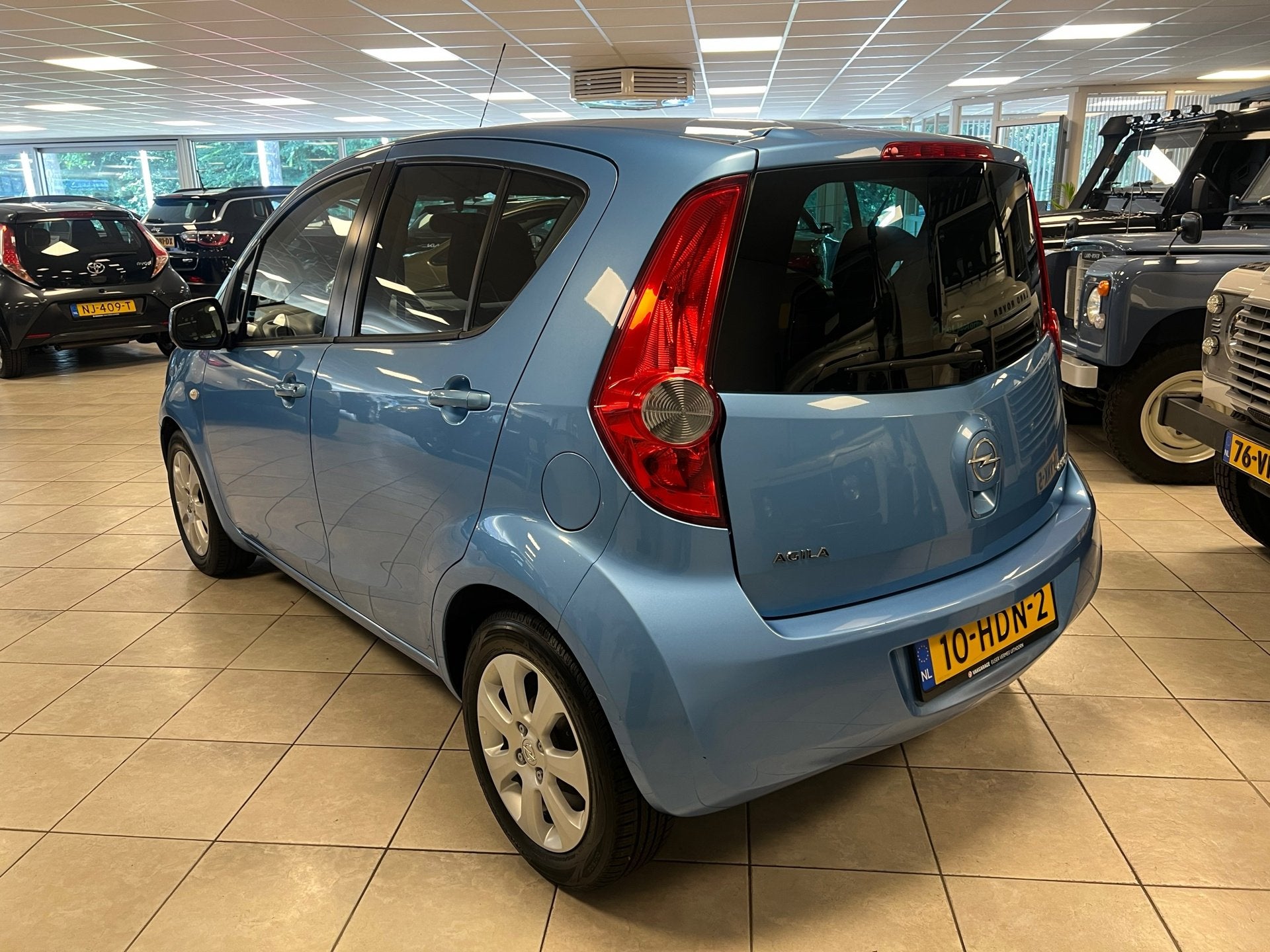 Opel Agila 1.0 Enjoy Airco, Stof, Gebruikt, Blauw, 996 cc