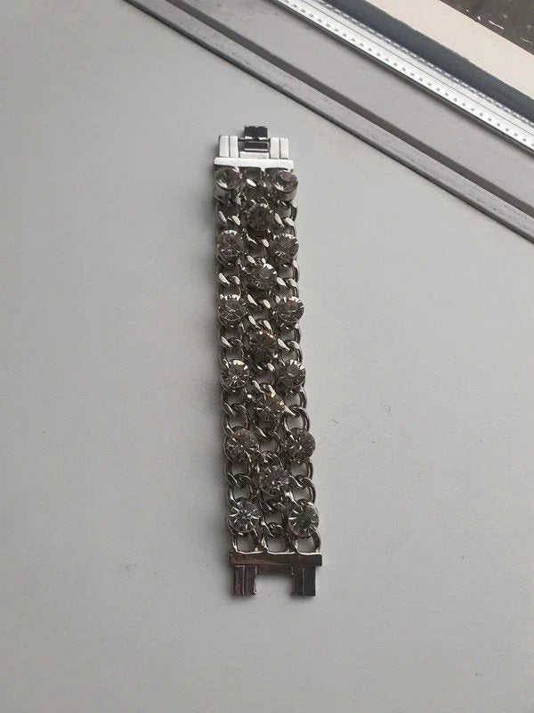 Brede Strass Schakelarmband Zilverkleurig Reparatie nodig, Ophalen of Verzenden, Zilver, Staal