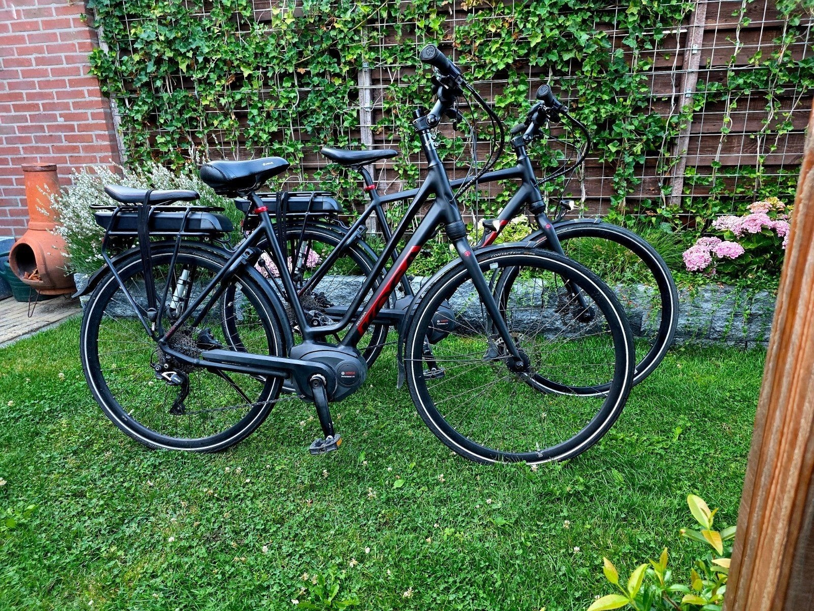 Prachtige Matzwarte Set Koga E-bikes met Grote Actieradius, Zo goed als nieuw, 50 km per accu of meer, 55 tot 59 cm, Ophalen