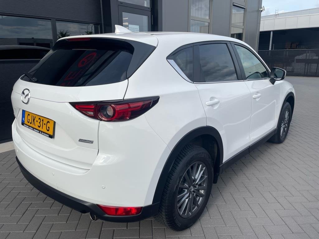 Mazda CX-5 2.0 SkyActiv-G 165 4WD Exclusive line, Auto's, Stof, Gebruikt, 4 cilinders, 2000 kg
