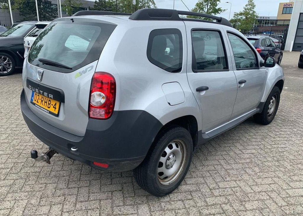 Dacia Duster 1.6i 105pk 4WD ! 1e eigenaar 129.000km. Trekhaa, Auto's, Dacia, 13 km/l, Euro 5, Stof, Gebruikt