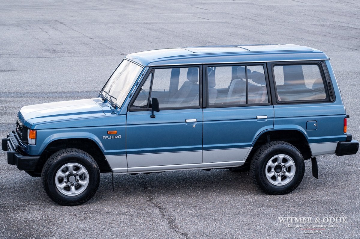 Mitsubishi Pajero Classic 3.0 V6 Long Body (bj 1990), Auto's, Mitsubishi, Automaat, Gebruikt, Blauw, Bedrijf