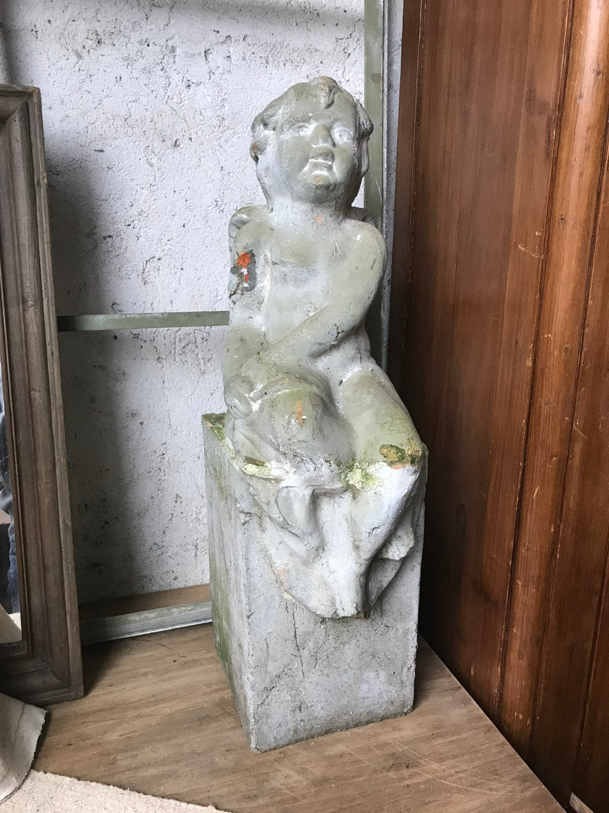 Antiek terracotta beeld (engel), Ophalen