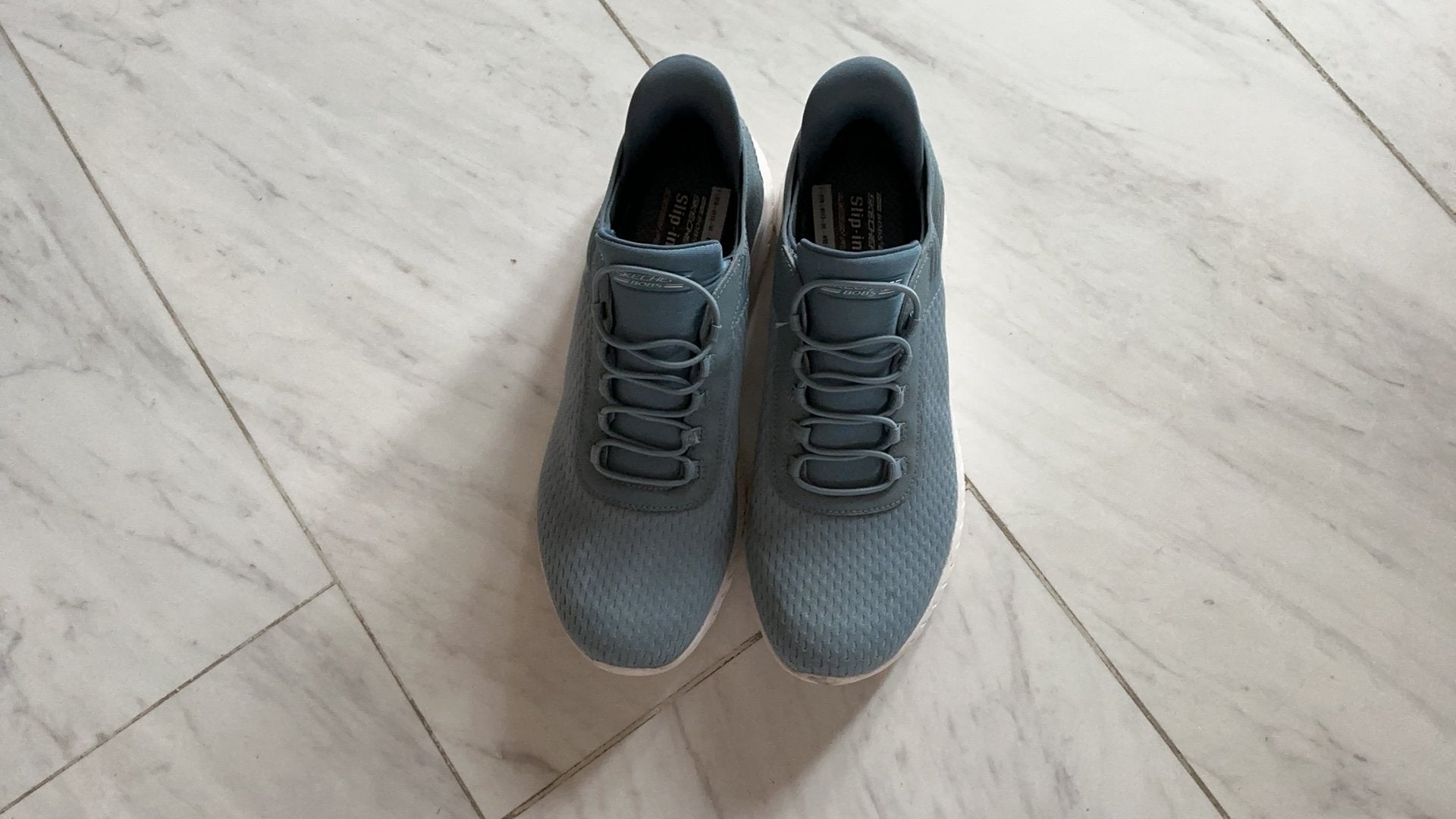Skechers slip inns Maat 42  Lichtblauw, Ophalen of Verzenden, Zo goed als nieuw, Schoentjes