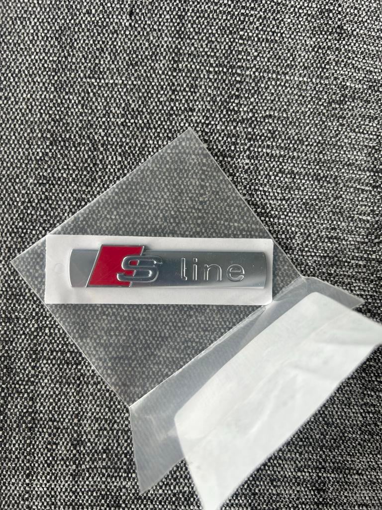 Origineel Audi S-Line Embleem - Nieuw in Verpakking, Ophalen of Verzenden, Nieuw