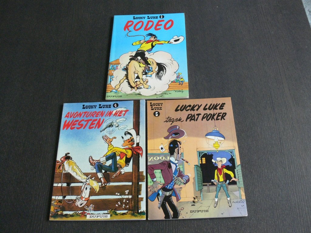 Lucky Luke (Dupuis) - deel 2,4,5,8,10,11,16,18,24,27 en 31, Boeken, Meerdere stripboeken, Verzenden, Zo goed als nieuw