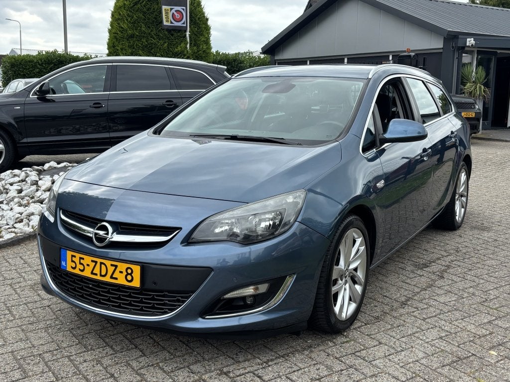 Opel Astra Sports Tourer 1.4 Turbo Sport 1E Eigenaar Trekhaa, Auto's, Opel, Euro 5, Gebruikt, 4 cilinders, Blauw