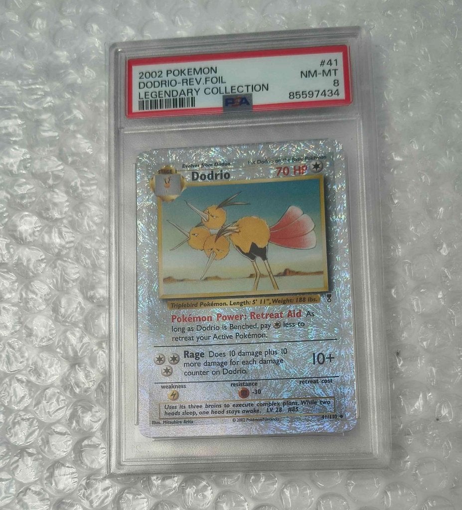 Pokemon Dodrio reverse holo legendary collection psa 8, Ophalen of Verzenden, Zo goed als nieuw, Losse kaart, Foil