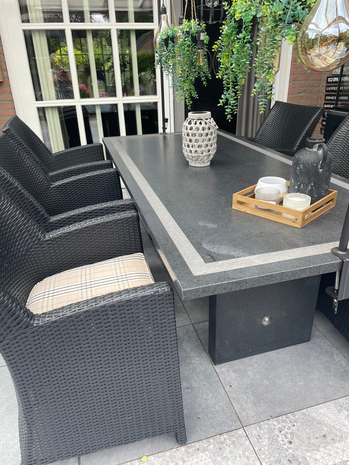 Granieten tuintafel met zes stoelen., Ophalen, Zo goed als nieuw, Tuinset