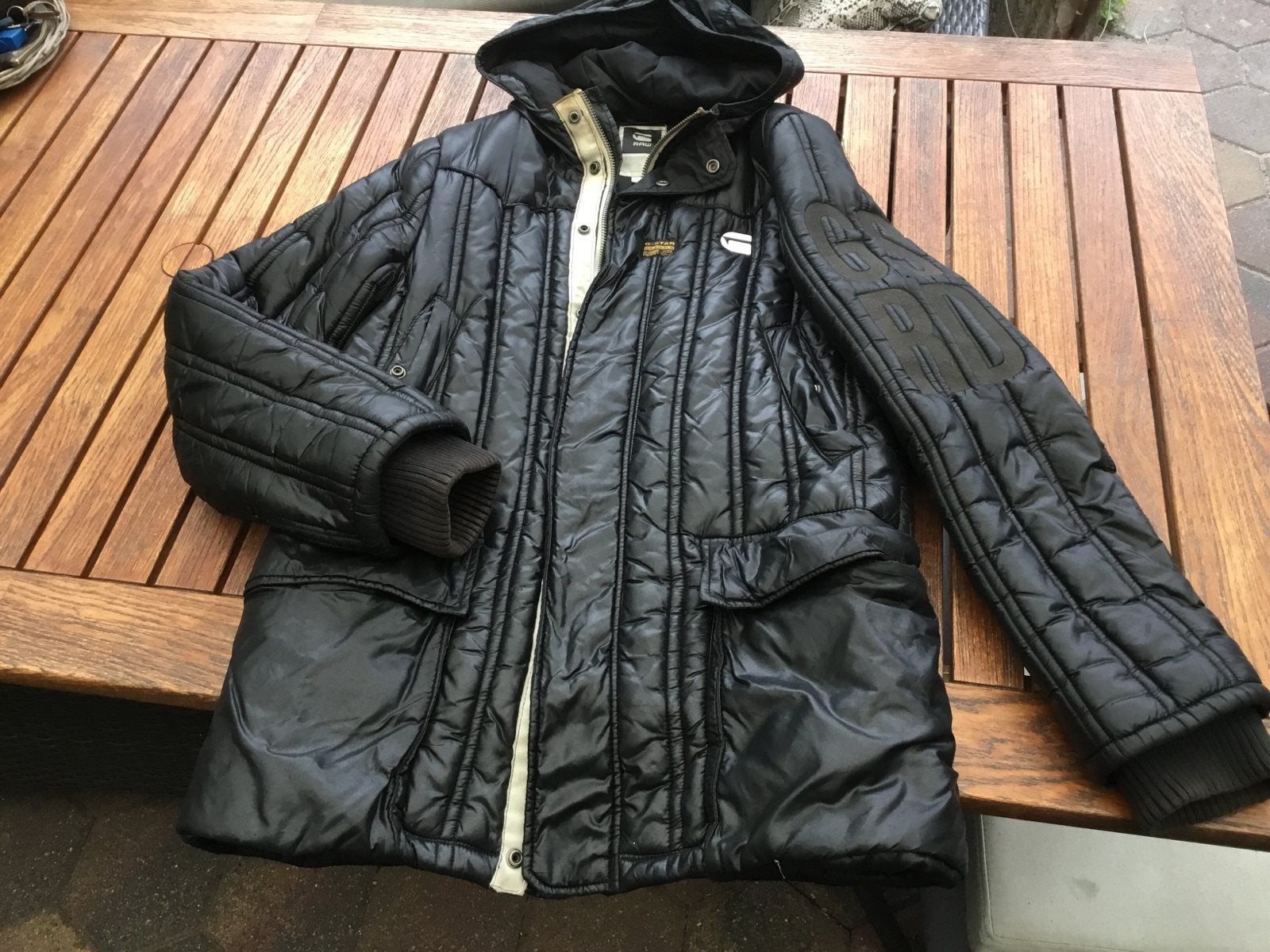 G-Star RAW gewatteerde winter jas met capuchon. Lang model., Ophalen of Verzenden, Gedragen, Maat 52/54 (L), Zwart