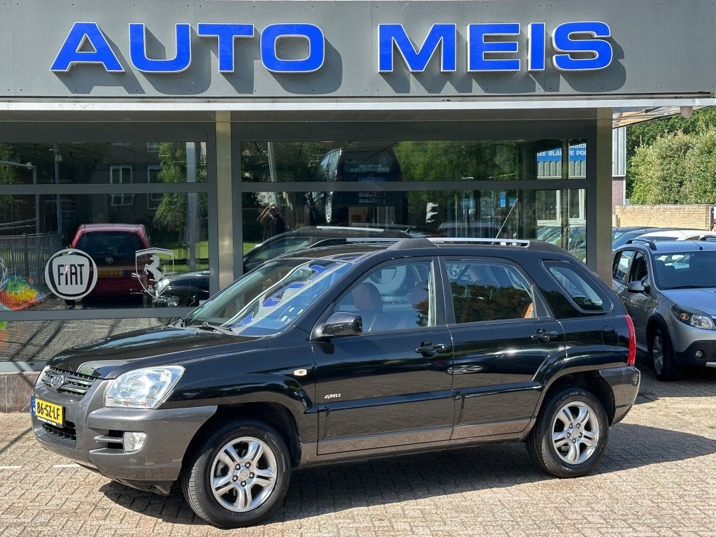 Kia SPORTAGE 2.7 V6 Adventure 4WD Automaat Leer Airco Cruise, Automaat, Gebruikt, 2656 cc, Zwart