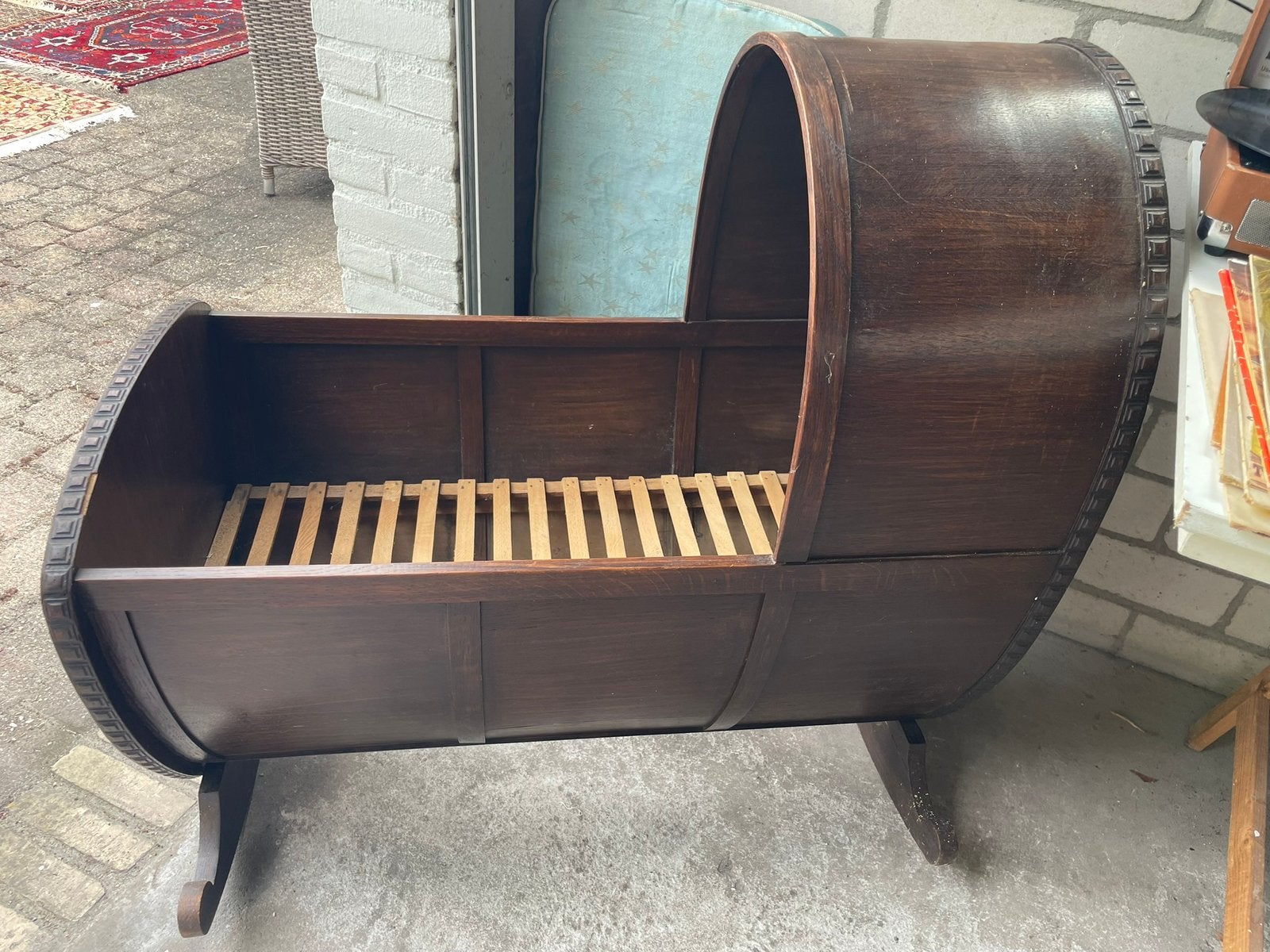 Brocante jouten wieg, Ophalen