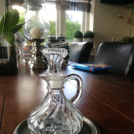 Karafje met tinnen onderplaatje, Ophalen