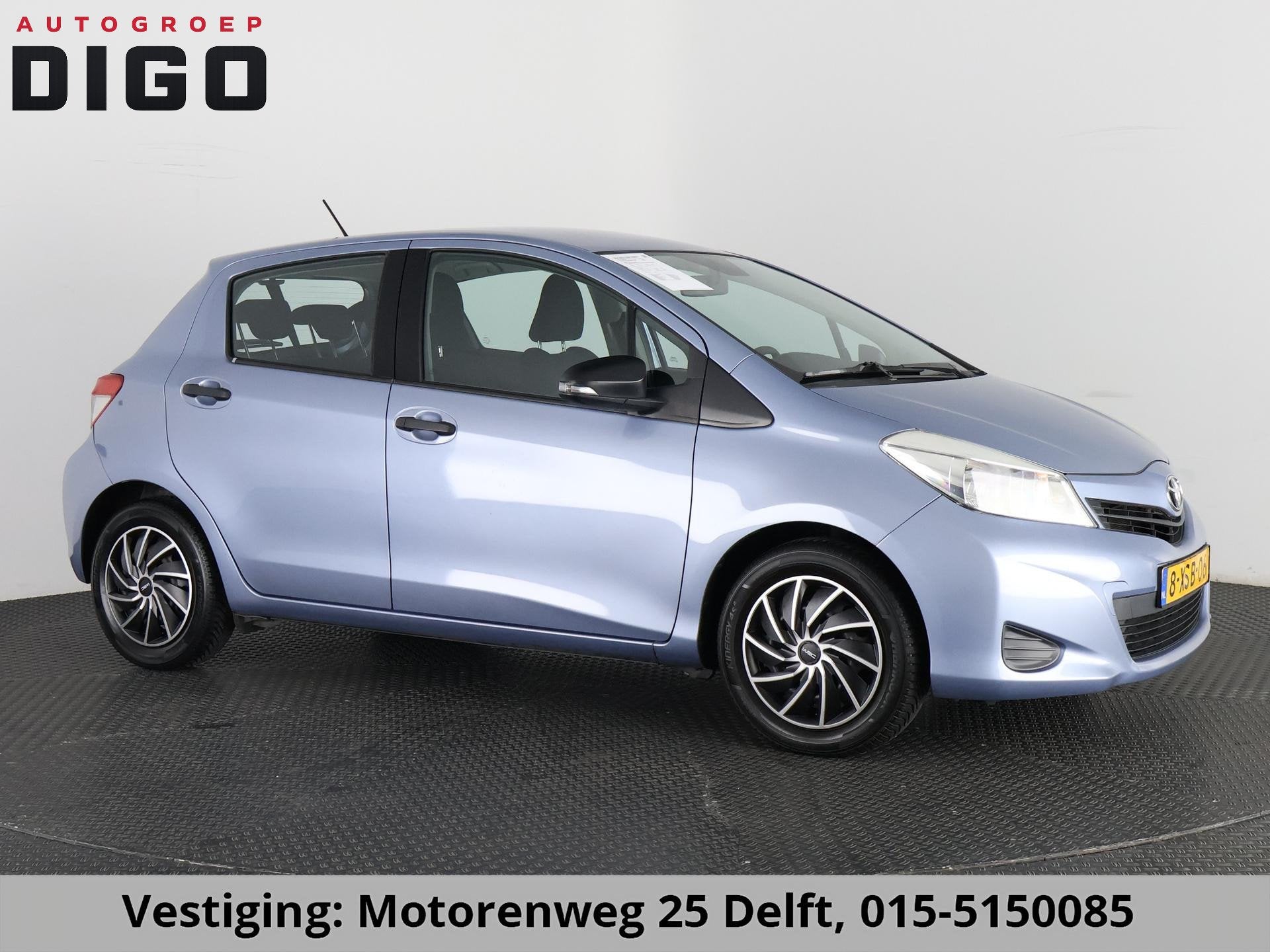 Toyota Yaris 1.3 VVT-i COMFORT-PACK NIEUW MODEL 2e EIG. AIRC, Auto's, Voorwielaandrijving, Stof, Zwart, 4 cilinders