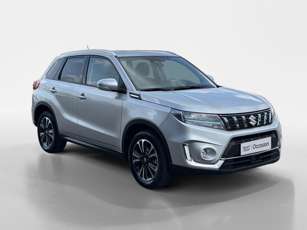 Suzuki Vitara 1.5 - 115PK Hybrid Style AllGrip Automaat | 4W, Auto's, Suzuki, 12 maanden, Gebruikt, 4 cilinders, 400 kg
