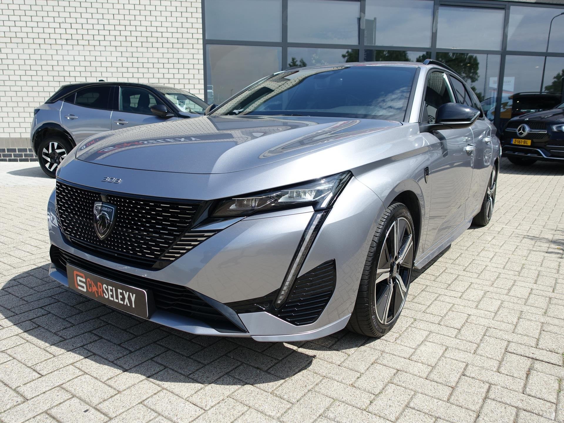 PEUGEOT 308 Sw 1.2 Hybrid 145pk e-DCS6 GT Supermooie Auto, Auto's, Gebruikt, 1199 cc, Automatische klimaatregeling, Hybride Elektrisch/Benzine