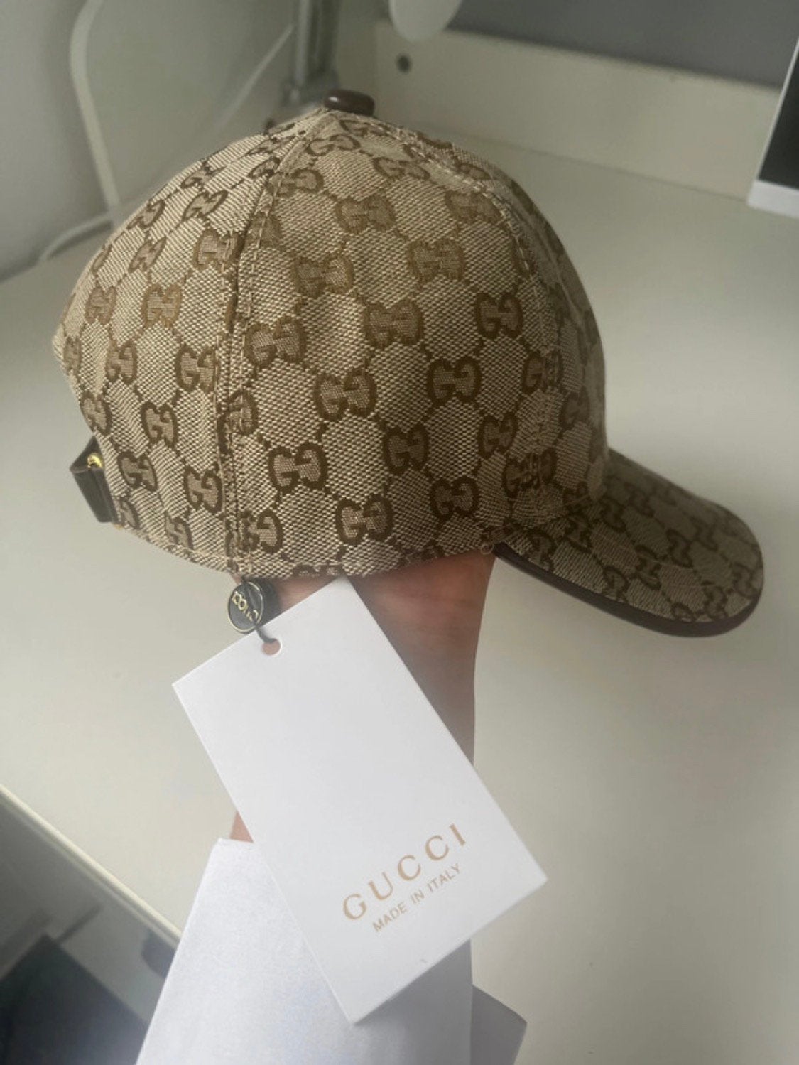 Gucci pet beige, Ophalen of Verzenden, Zo goed als nieuw, One size fits all, Pet