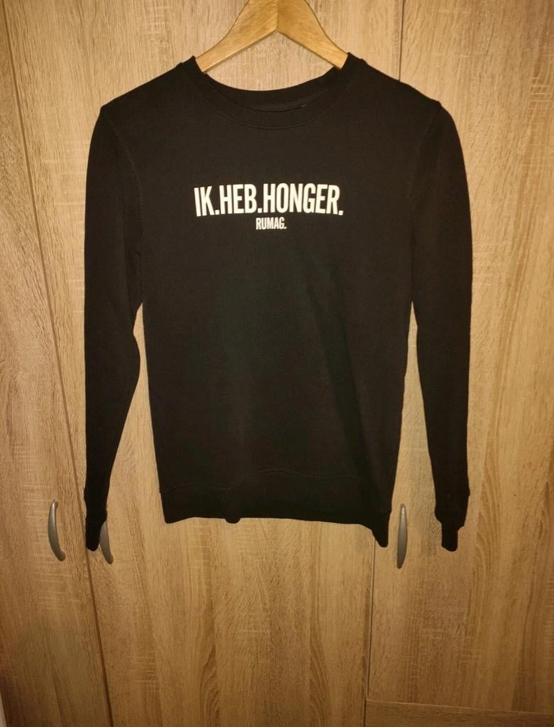 Zwarte sweater met 'IK HEB HONGER' opdruk - RUMAG., Kleding | Dames, Ophalen, RUMAG., Zwart, Maat 34 (XS) of kleiner