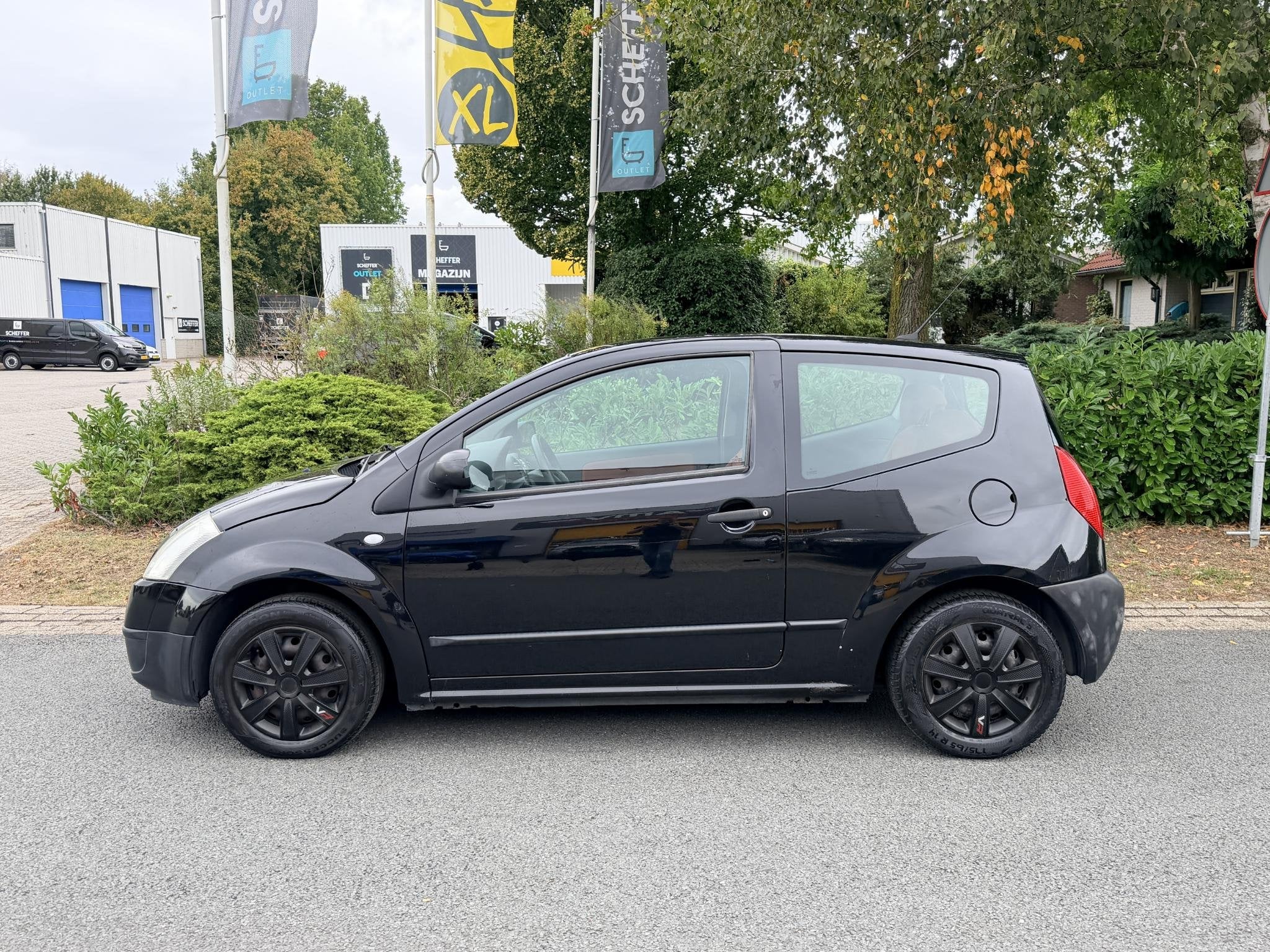 Citroen C2 1.1i Ligne Prestige 60PK, Auto's, Voorwielaandrijving, 31 €/maand, 4 cilinders, Zwart