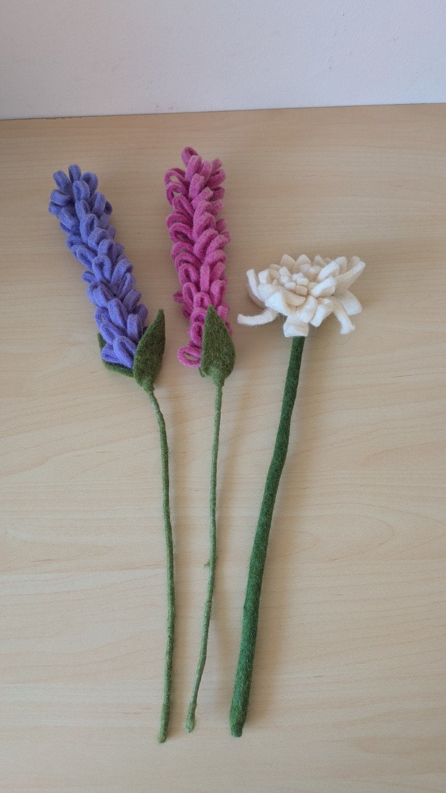 Vilten bloemen, Ophalen