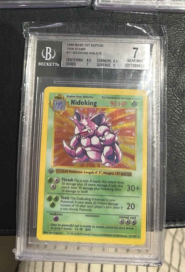 Nidoking Base Set 1st Edition BGS 7 Pokémon Kaart, Ophalen of Verzenden, Zo goed als nieuw, Losse kaart