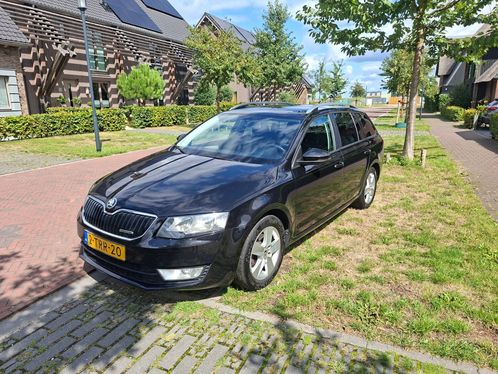 Skoda Octavia 1.6 TDI 81KW Combi 2014 Zwart Trekhaak, Voorwielaandrijving, 4 cilinders, Zwart, Origineel Nederlands