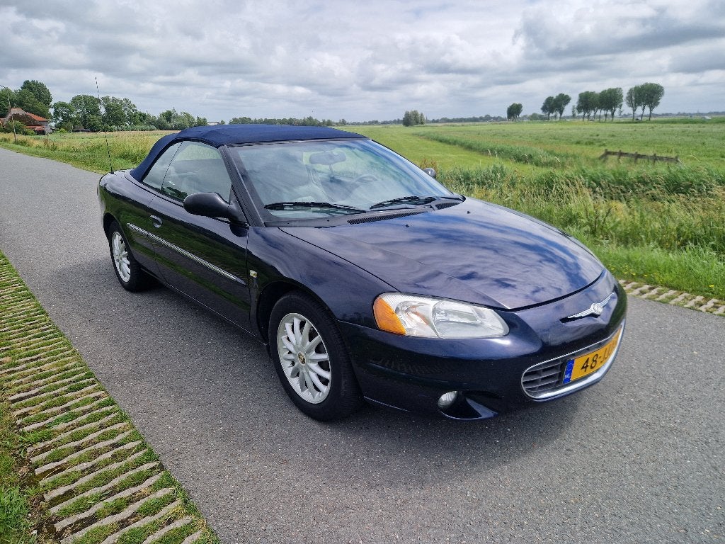 Chrysler Sebring 2.7 i V6 Cabrio Automaat Nwe APK Weinig Km, Auto's, Euro 5, Cabriolet, Blauw, 2500 kg