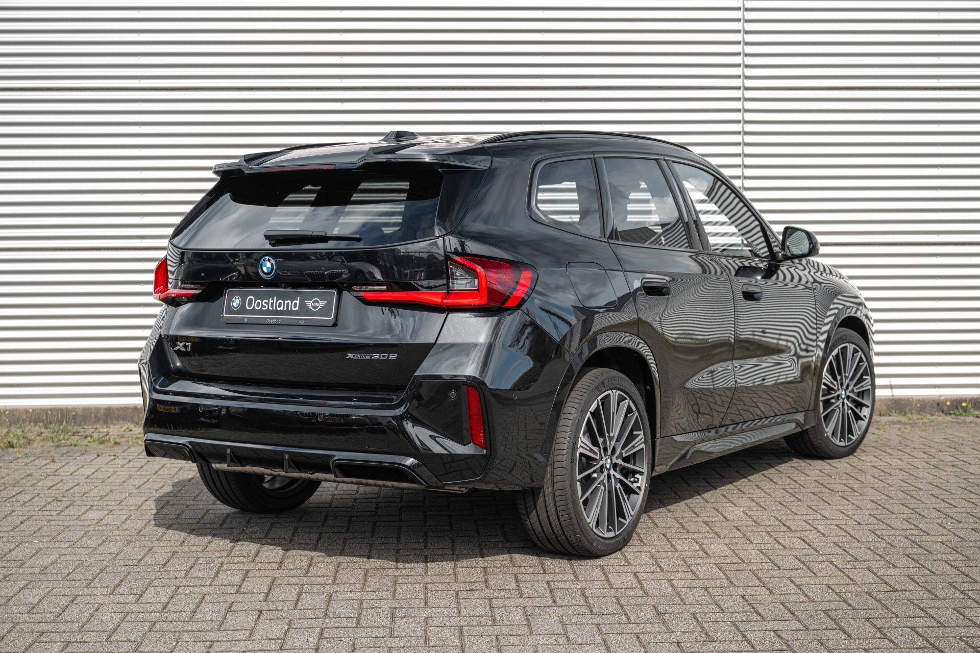 BMW X1 xDrive30e M Sport Automaat / Panoramadak / Trekhaak /, Auto's, Stoelverwarming, Zwart, Leder, Hybride Elektrisch/Benzine