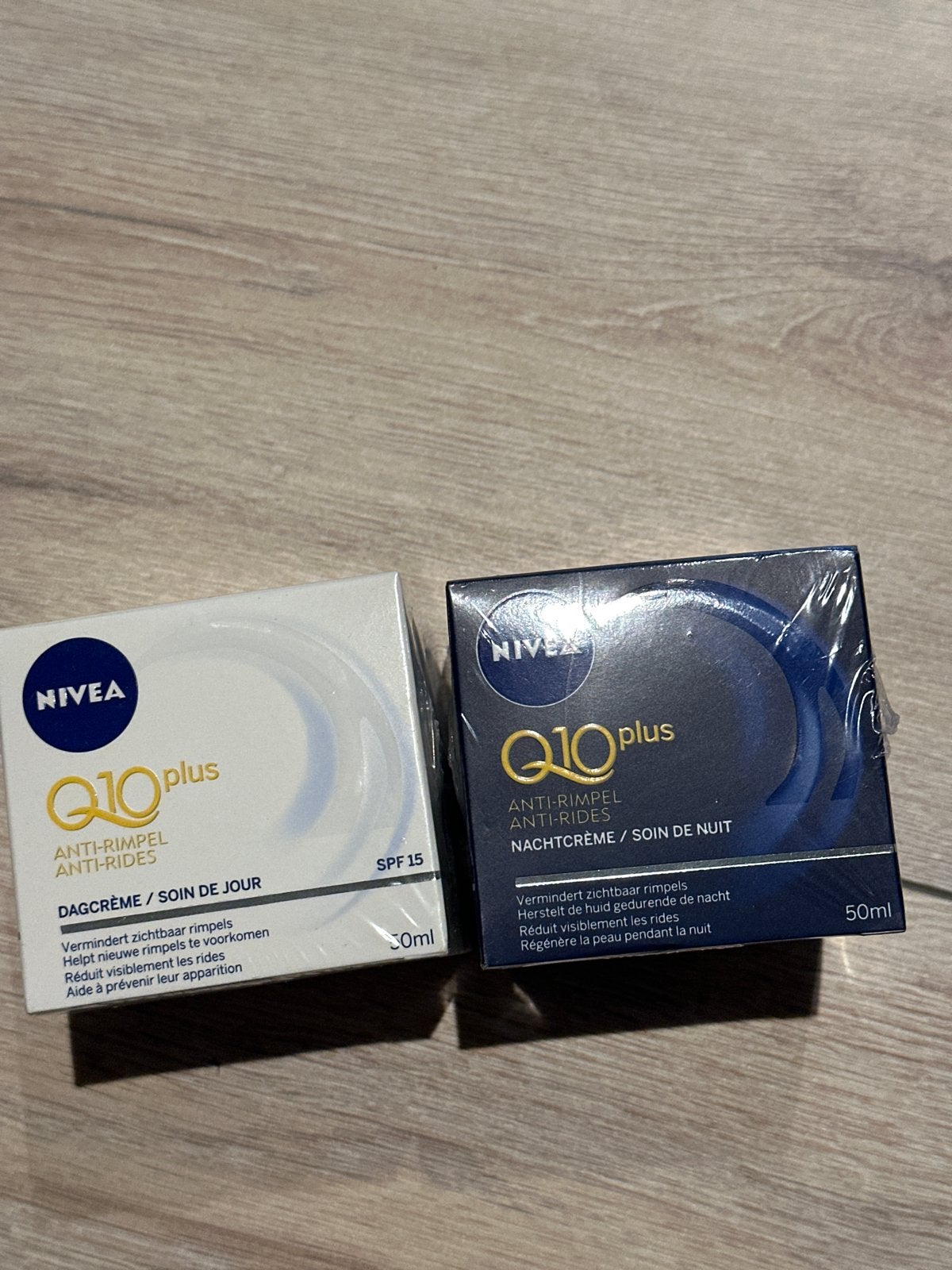 Nivea Q10 Dagcrème & Nachtcrème SPF 15, Ophalen of Verzenden, Nieuw, Bodylotion, Crème of Olie
