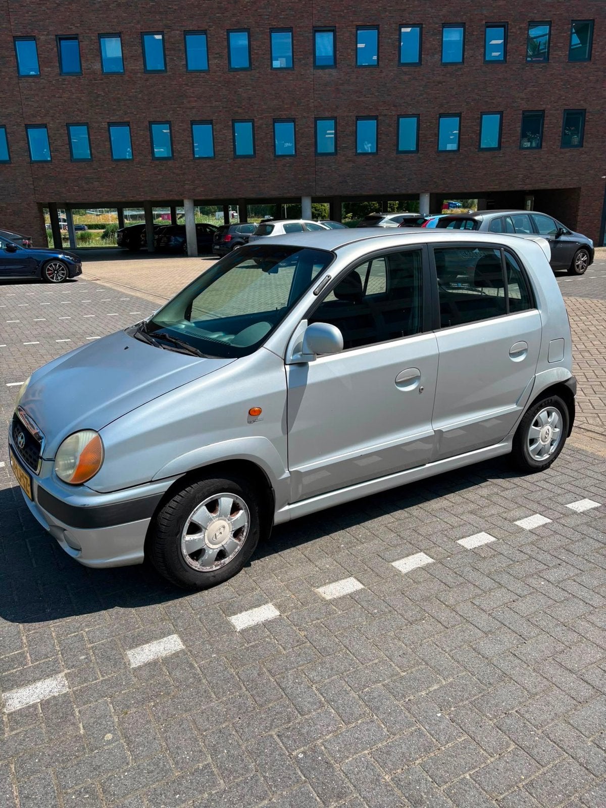 Hyundai Atos 1.0 I 2003 Grijs, Auto's, Voorwielaandrijving, Zwart, 4 cilinders, Origineel Nederlands