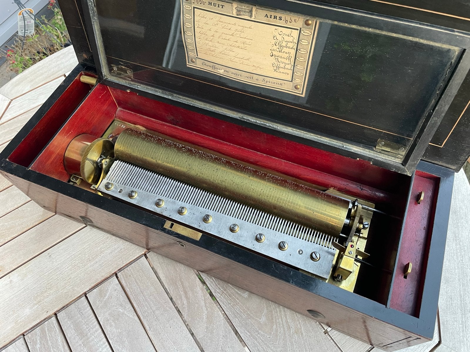 Antieke cylinder speeldoos Langdorff met 8 melodieën, Ophalen